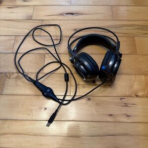 Black xg gaming headphones with Wired Connection